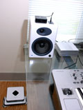 I didn't want low-grade computer speakers...I wanted <i>reasonably</i> high quality 'self-powered monitors' that didn't require a bulky amplifier.  I found the <a href='http://audioengineusa.com/Store/Audioengine-5#overview' target='blank'>AudioEngine A5</a> series through a Google Image search for white speakers with gray accents, and discovered they had rave reviews for price/performance.  I've been happy, especially with the auxiliary input on top that was made for iPods but works even better with a <a href='http://www.logitech.com/en-my/speakers-audio/home-pc-speakers/devices/8087' target='blank'>Logitech Wireless Speaker Adapter for Bluetooth</a>!
